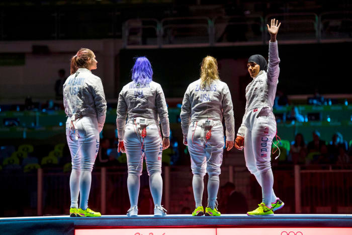 Muhammad (far right) in Rio, where she earned a 2016 bronze medal in team sabre.